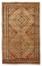 A KHOTAN RUGA Khotan rug,  Ear