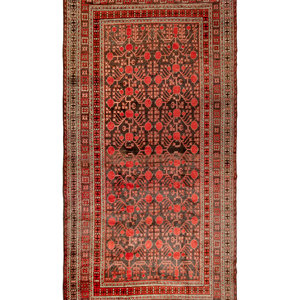 A Khotan Wool Rug Circa 1900 12