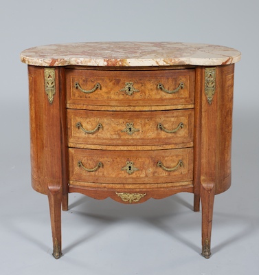 A Kidney Shape Bombe Commode with