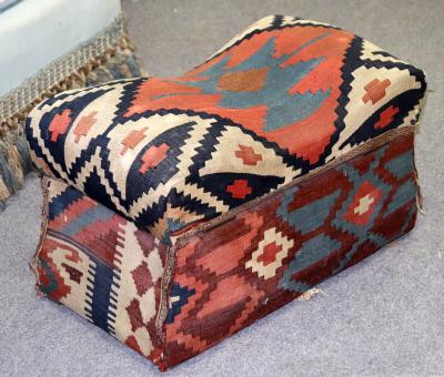 A kilim covered box top stool