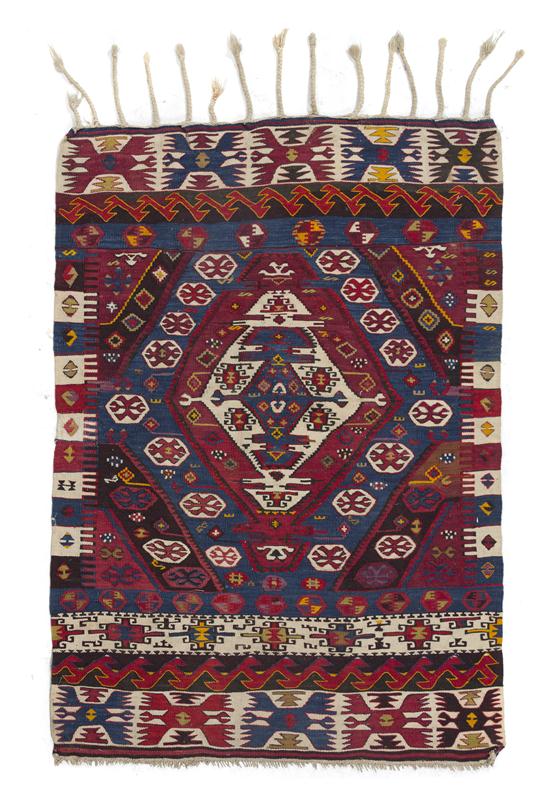 A Kilim Flatweave Carpet having a