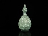 A KOREAN CELADON-GLAZED DOUBLE