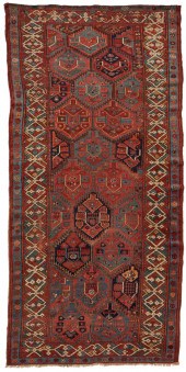 A KURD AREA RUGA Kurd area rug