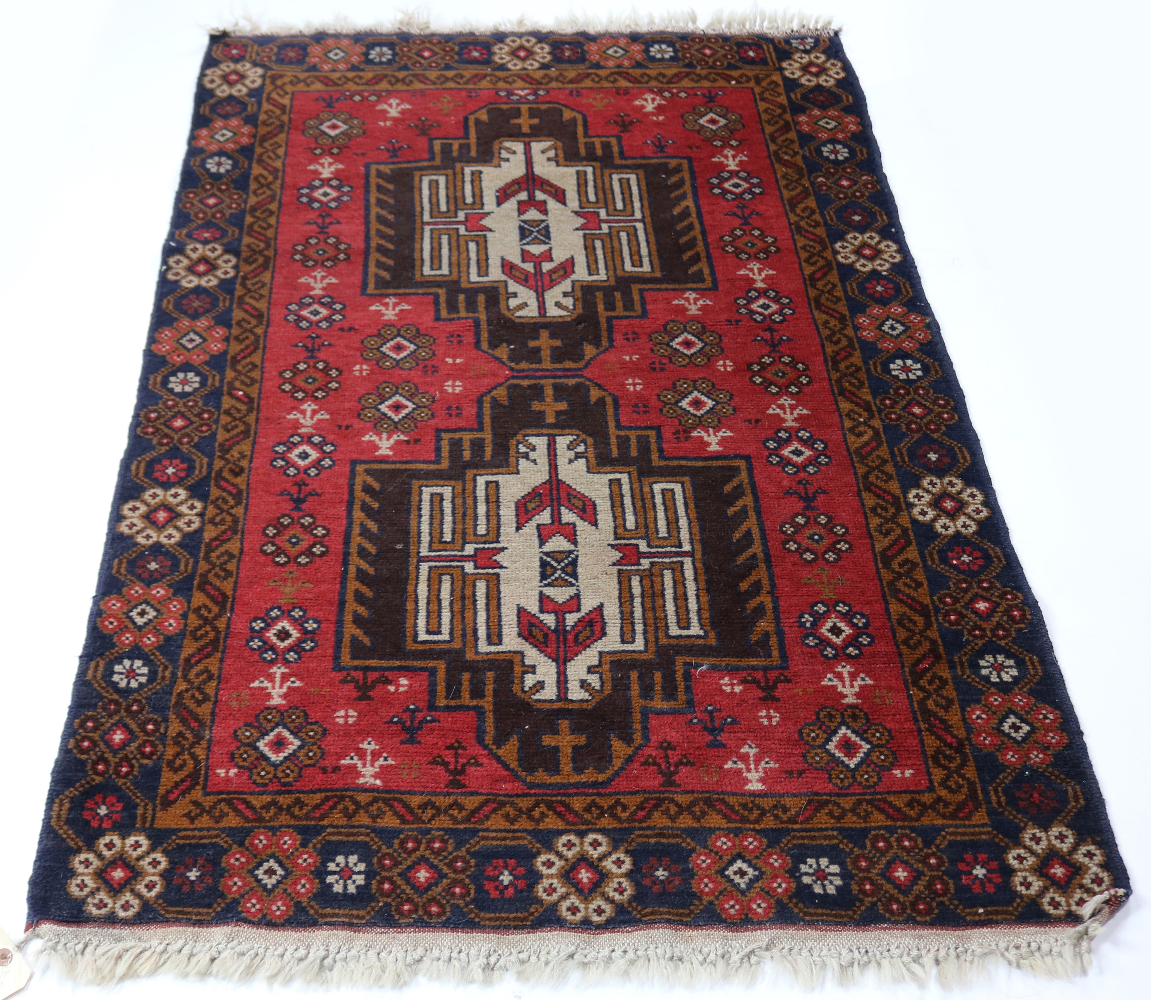 A KURDISH CARPET, 2'10" X 4'5" A