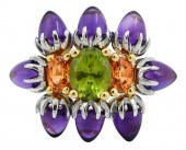 A LA PAGODE 18KT. PERIDOT, CIT