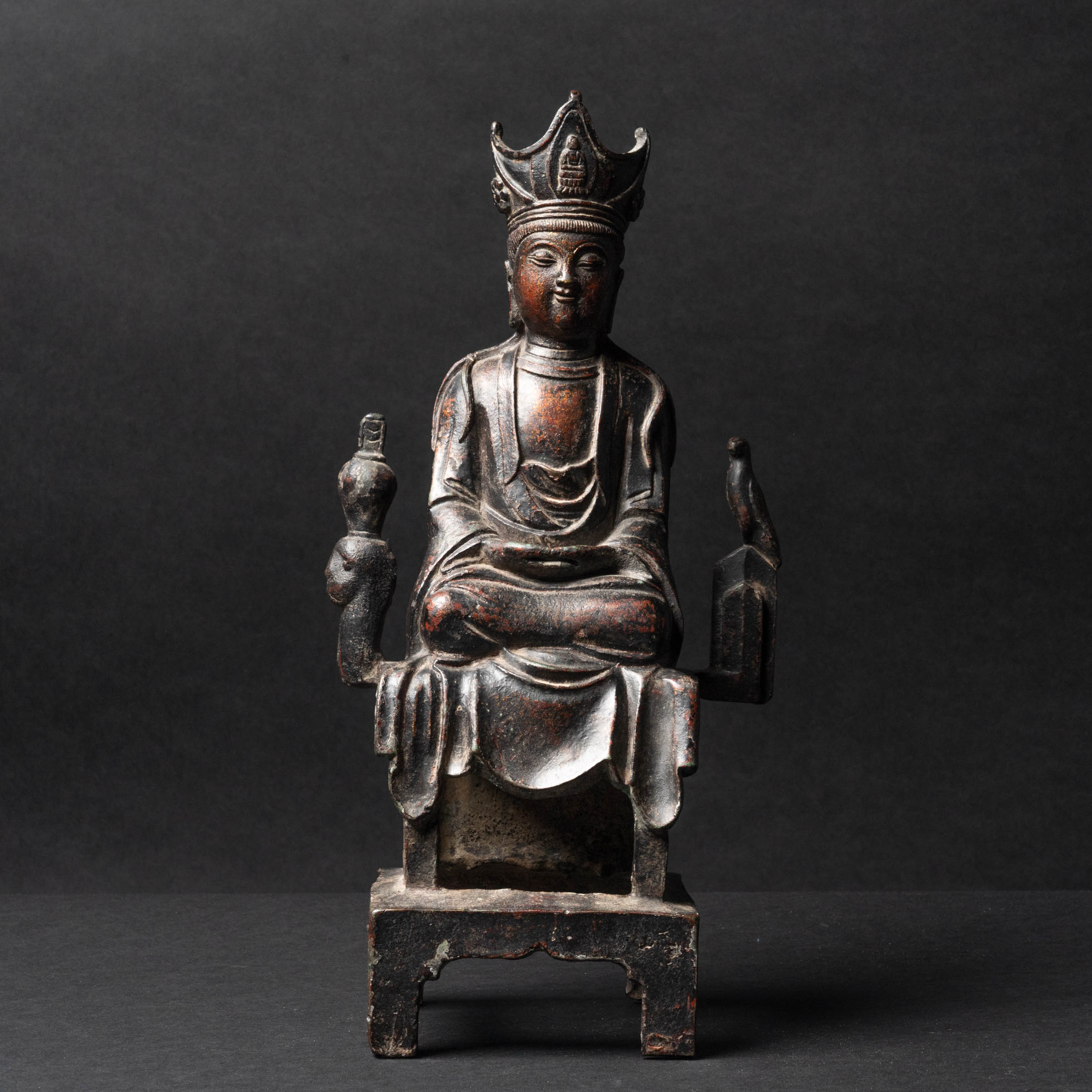 A Lacquered Bronze Seated Figure of