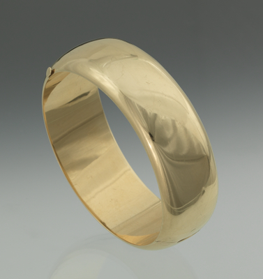 A Ladies' 14k Gold Bangle