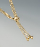 A Ladies' 14k Gold Bead Lariat