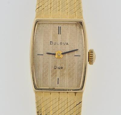 A Ladies' 14k Gold Bulova Dior