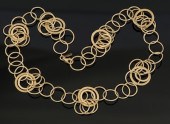 A Ladies' 14k Gold Circle Neck
