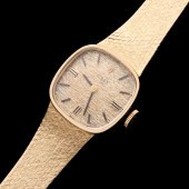 A LADIES 14K GOLD ROLEX WRIST