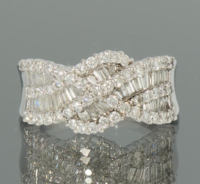 A Ladies' 18k and Diamond Ring