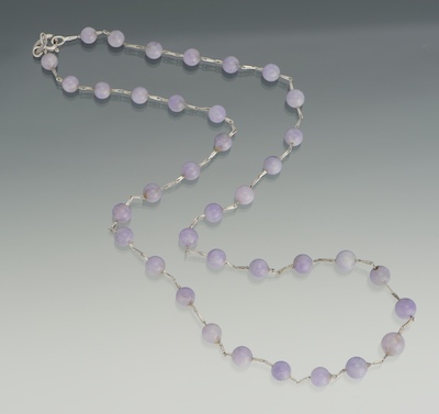 A Ladies' 18k Gold and Lavender