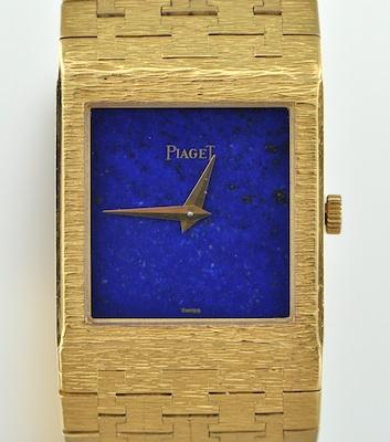 A Ladies' 18k Gold and Lapis