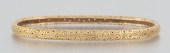 A Ladies' 18k Gold Bangle Brac