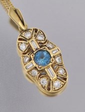 A Ladies' 18k Gold Pendant Wit