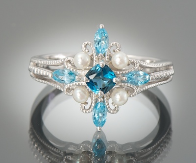 A Ladies' 18k Gold Topaz and