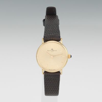 A Ladies' Baume & Mercier 14k