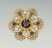 A Ladies' Blue Sapphire and Pe