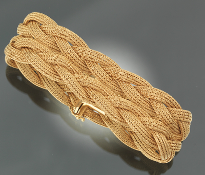 A Ladies' Braid Design Bracelet 18k