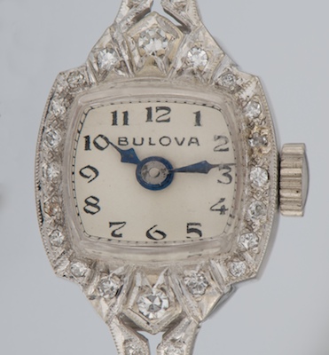 A Ladies' Bulova Gold and Diamond