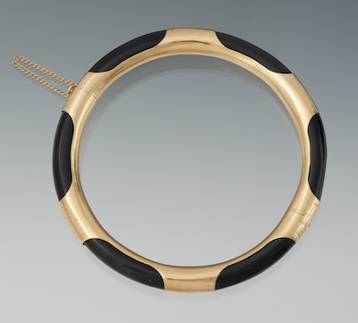 A Ladies' Carved Onyx and Gold