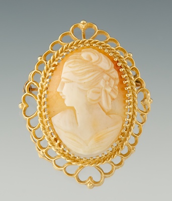 A Ladies' Carved Shell Cameo Brooch