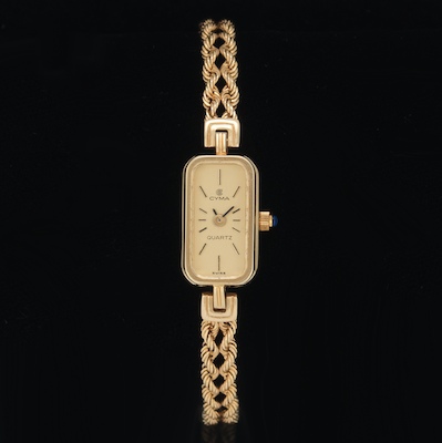 A Ladies' Cyma Gold Watch 14k