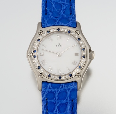 A Ladies' Diamond and Sapphire Dial
