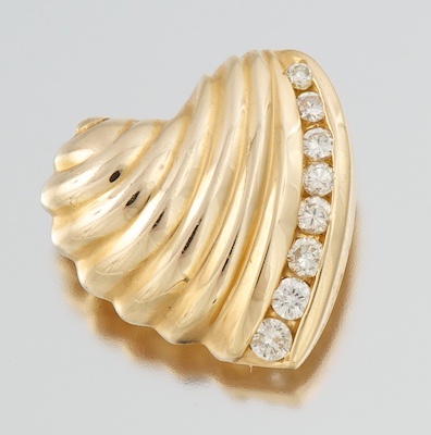 A Ladies' Diamond Heart Pendant 14k