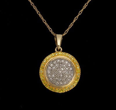 A Ladies' Diamond Pendant on