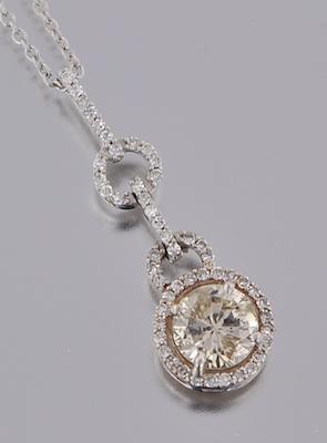 A Ladies' Diamond Pendant on