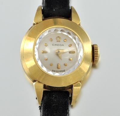 A Ladies' Diminutive 14k Gold Omega