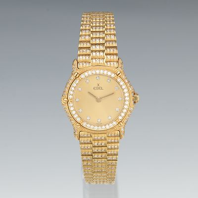A Ladies' Ebel 18k Gold and Diamond