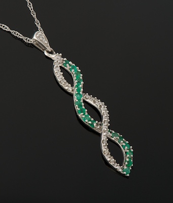 A Ladies' Emerald and Diamond