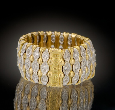 A Ladies' Flexible 18k Gold and