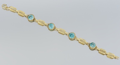 A Ladies' Gold and Blue Zircon