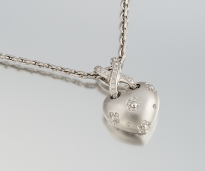 A Ladies' Gold and Diamond Heart