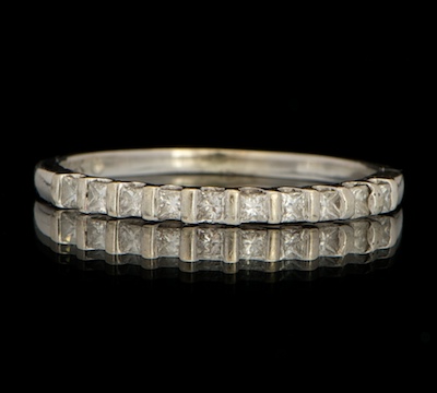 A Ladies' Gold and Diamond Band 14k