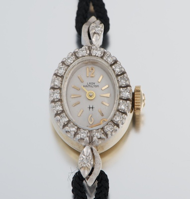 A Ladies' Gold and Diamond Lady