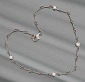 A Ladies' Gold and Diamond Ank