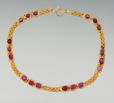 A Ladies' Gold and Ruby Bracelet