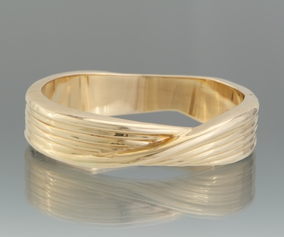 A Ladies' Gold Bangle Bracelet