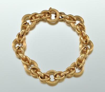 A Ladies' Gold Bracelet Tested