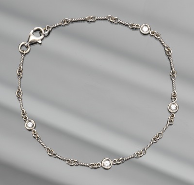 A Ladies' Gold Chain and Diamond