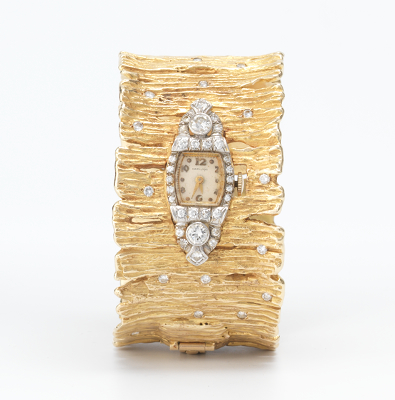 A Ladies' Gold Cuff Bracelet with
