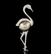A Ladies' Gold Pearl and Diamo