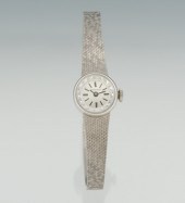 A Ladies' Longines 14k Gold Dr