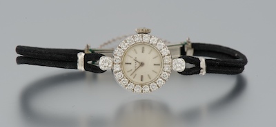A Ladies' Movado 14k Gold and