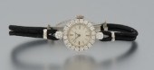 A Ladies' Movado 14k Gold and